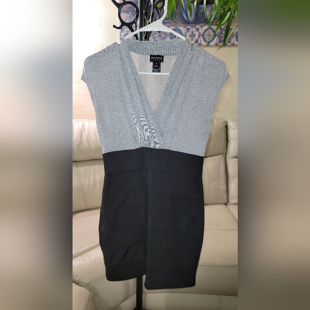 "En Focus studio" size 6 mini dress color black and silver(sparkle)